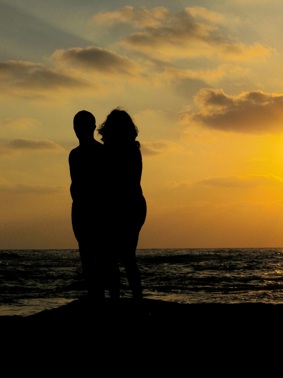 sunset couple silhouette free photo