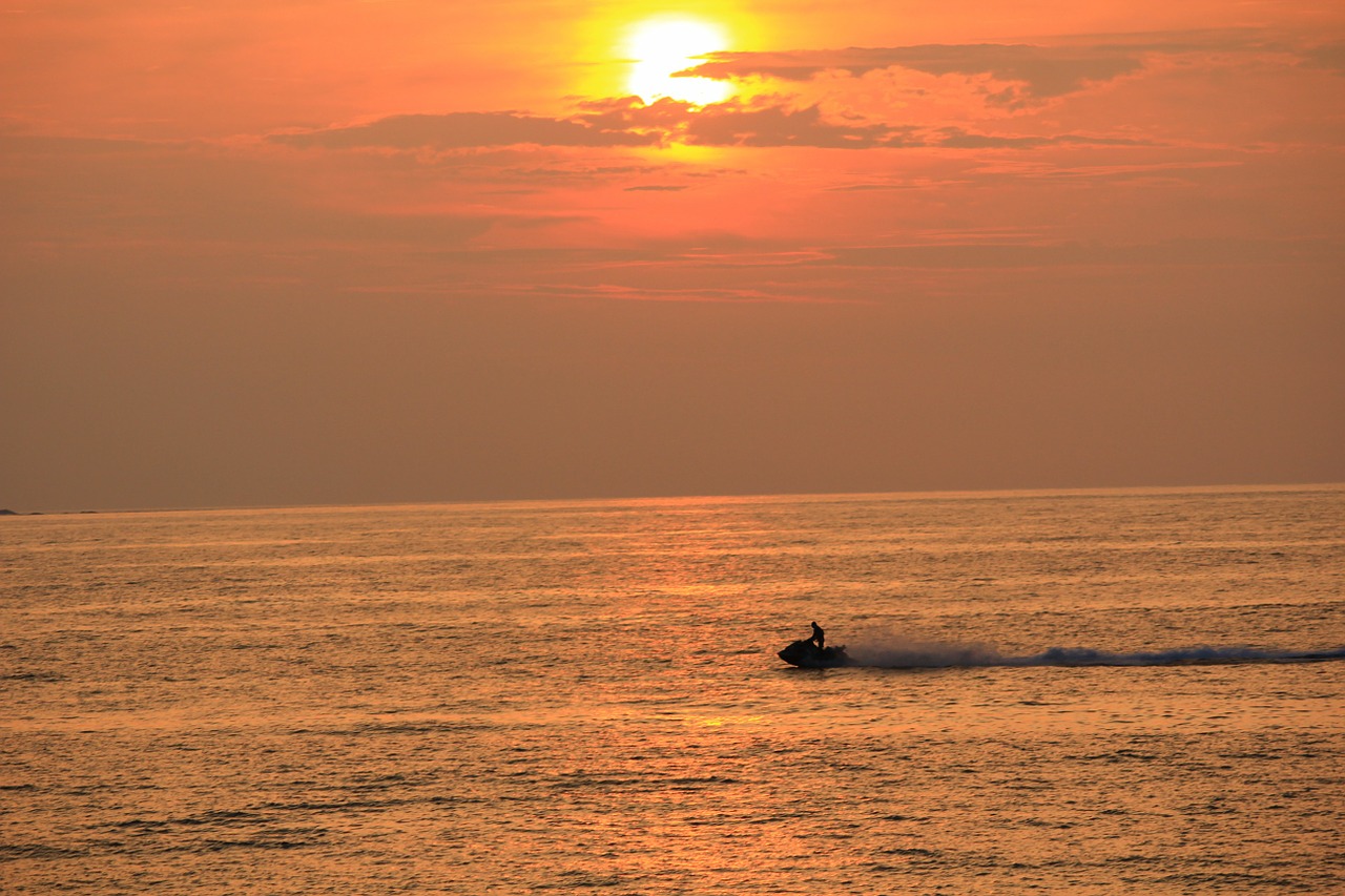 sunset boat sea free photo