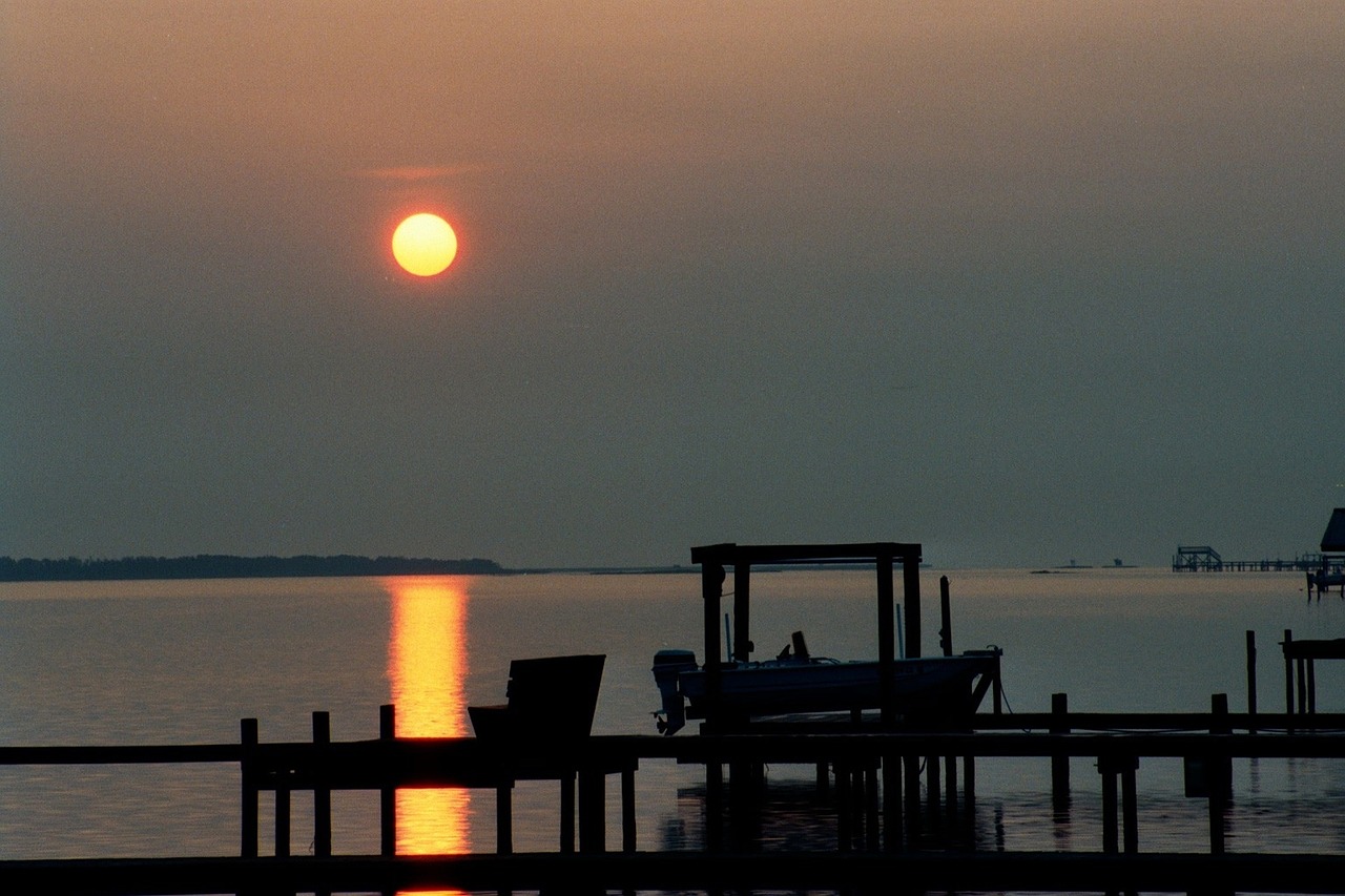 sunset boat ocean free photo