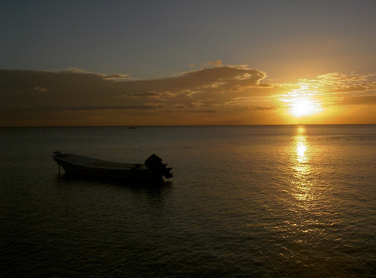 sunset boot sea free photo