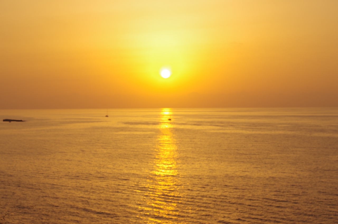 sunset sea sunset boats sunset free photo