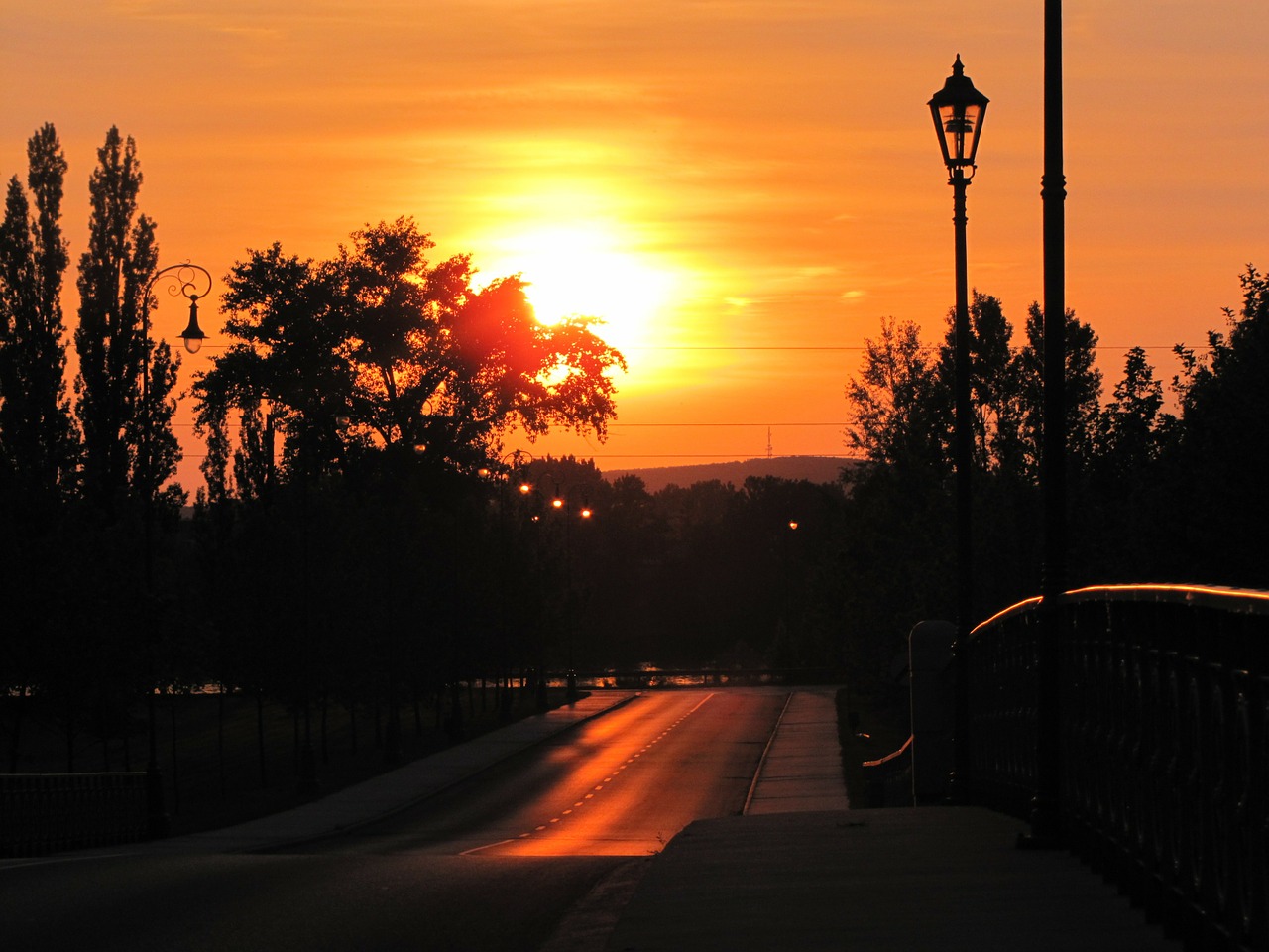 sunset road lamps free photo