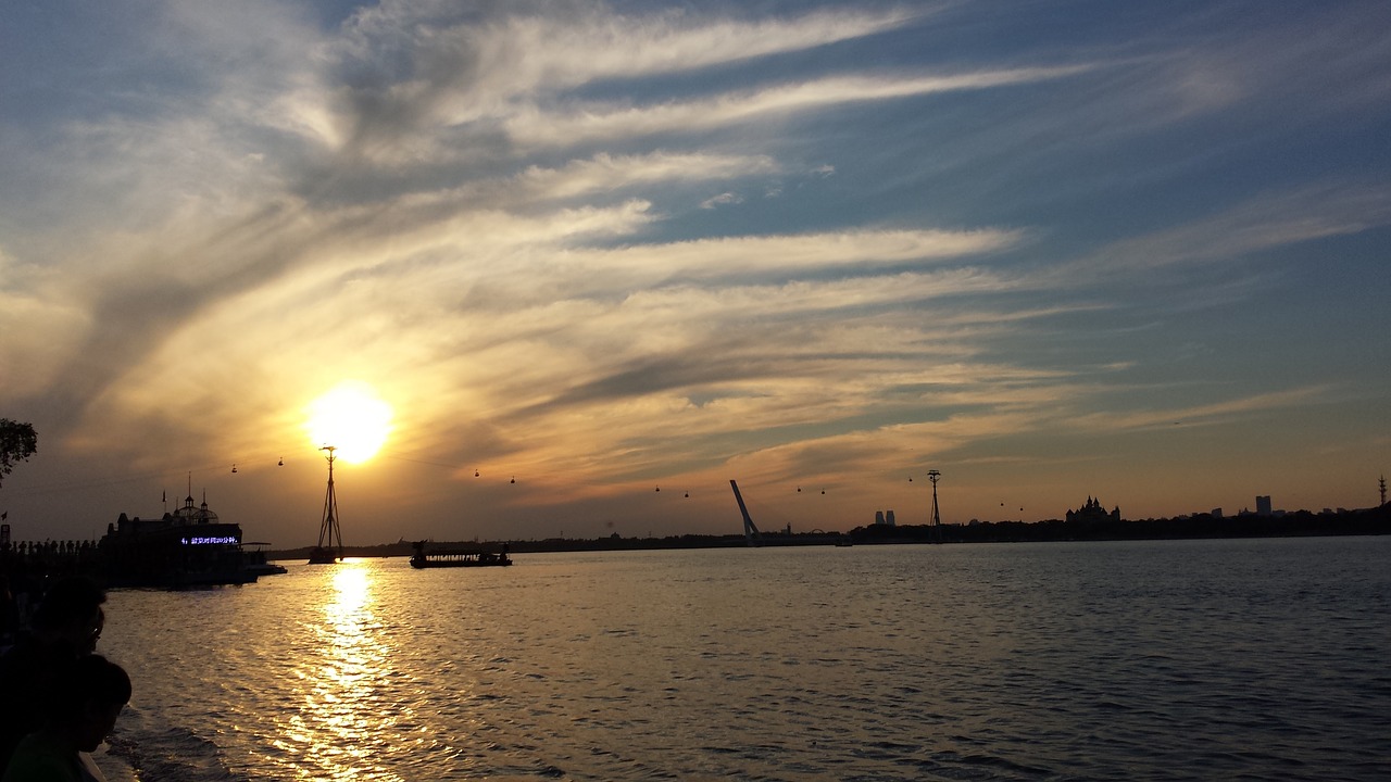 sunset the songhua river the shore free photo