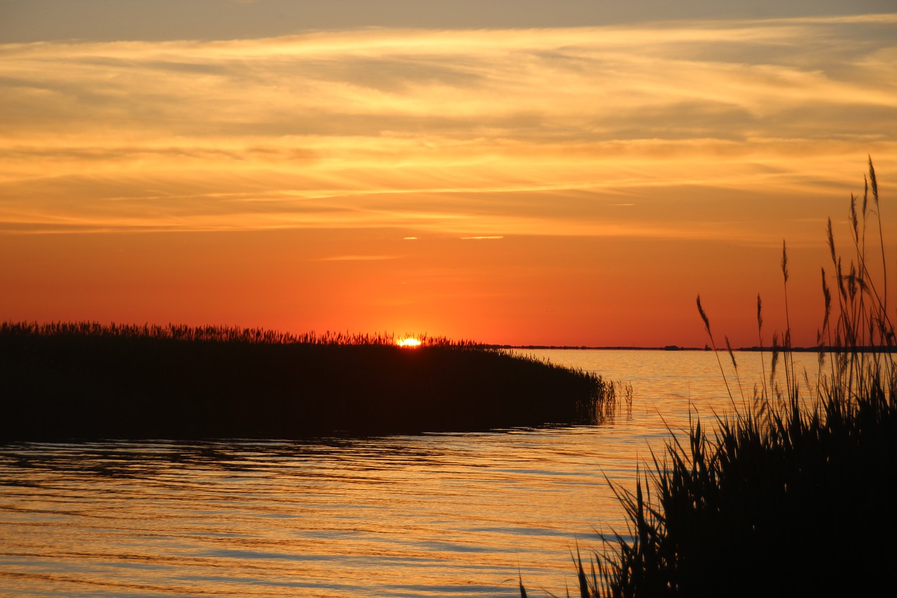 sunset baltic sea booked free photo