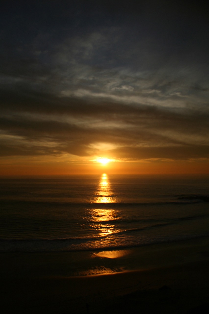 sunset beach clouds free photo