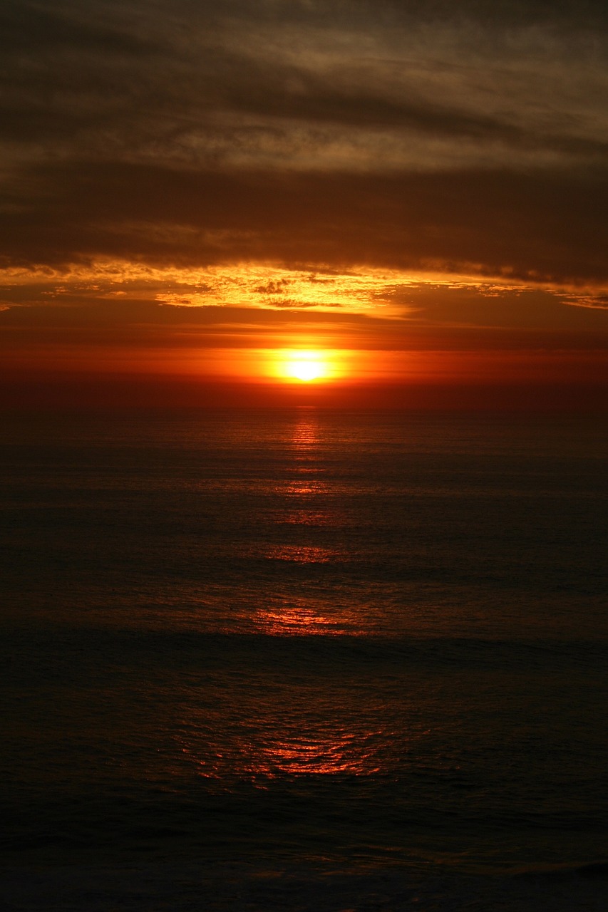 sunset beach clouds free photo