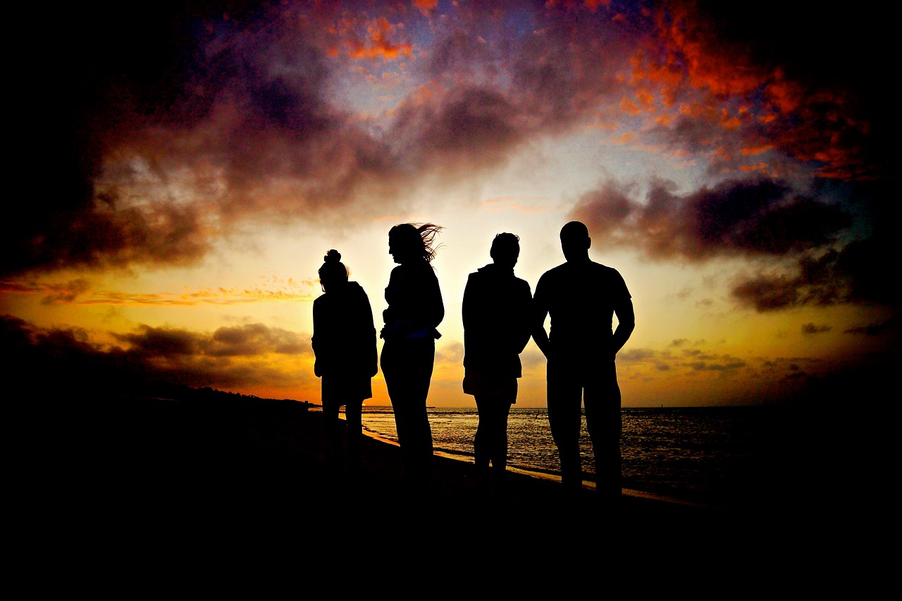 sunset beach silhouettes free photo