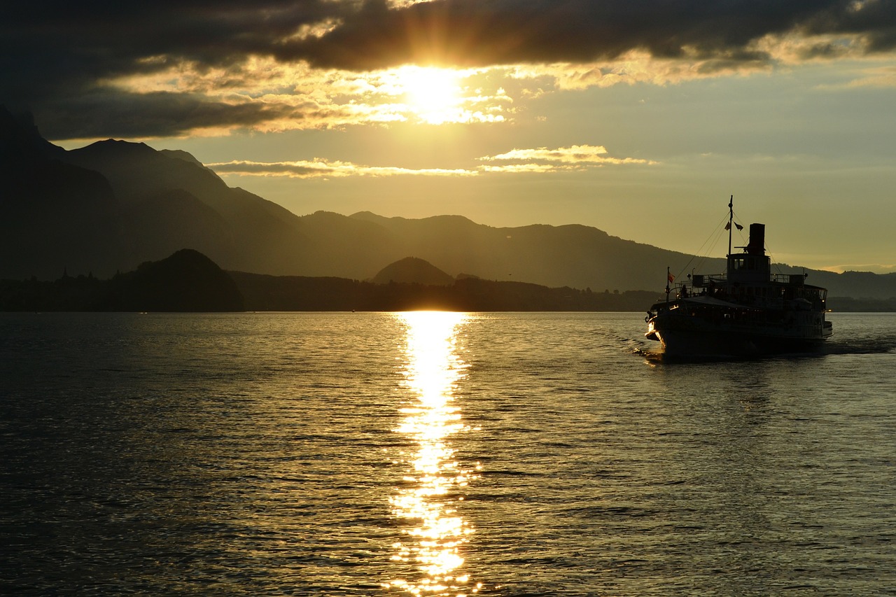 sunset boat switzerland free photo