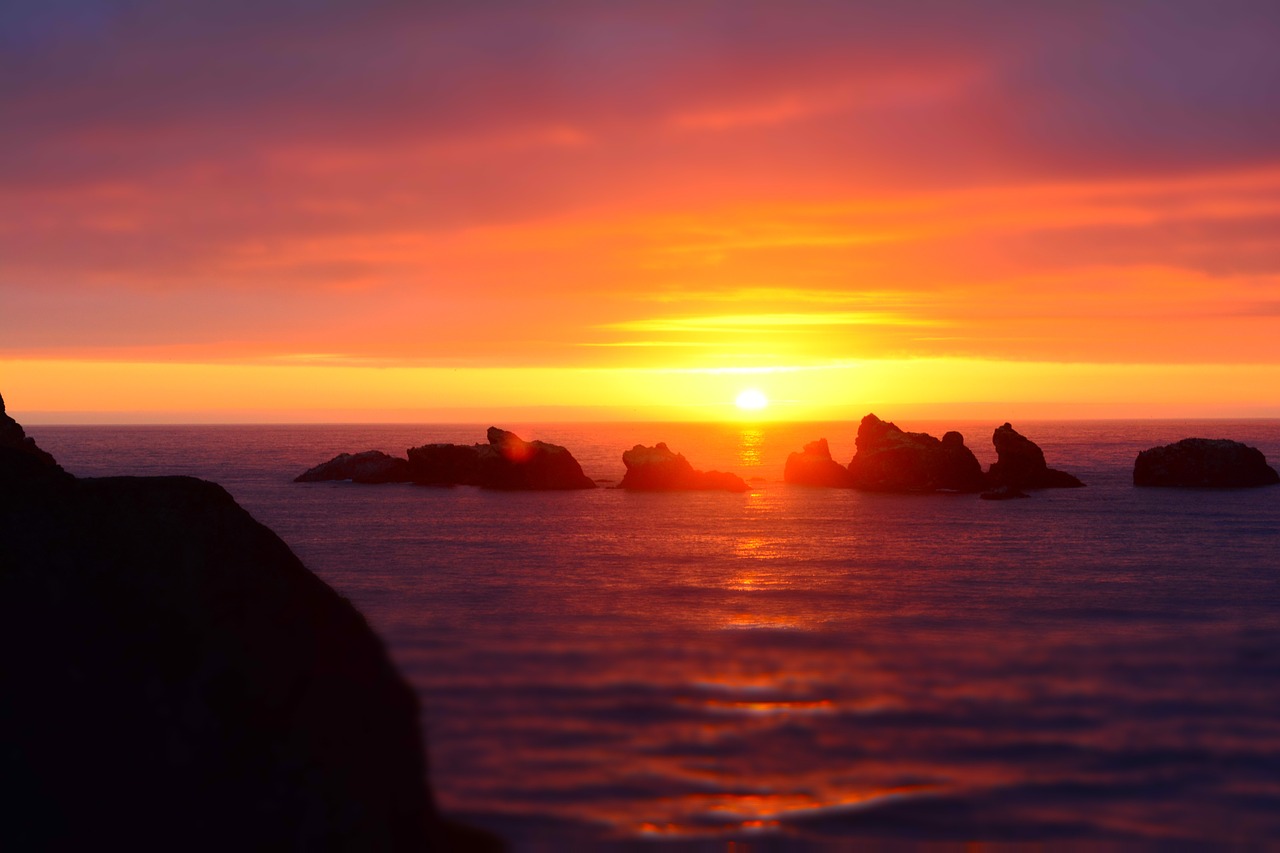 sunset coast rocks free photo