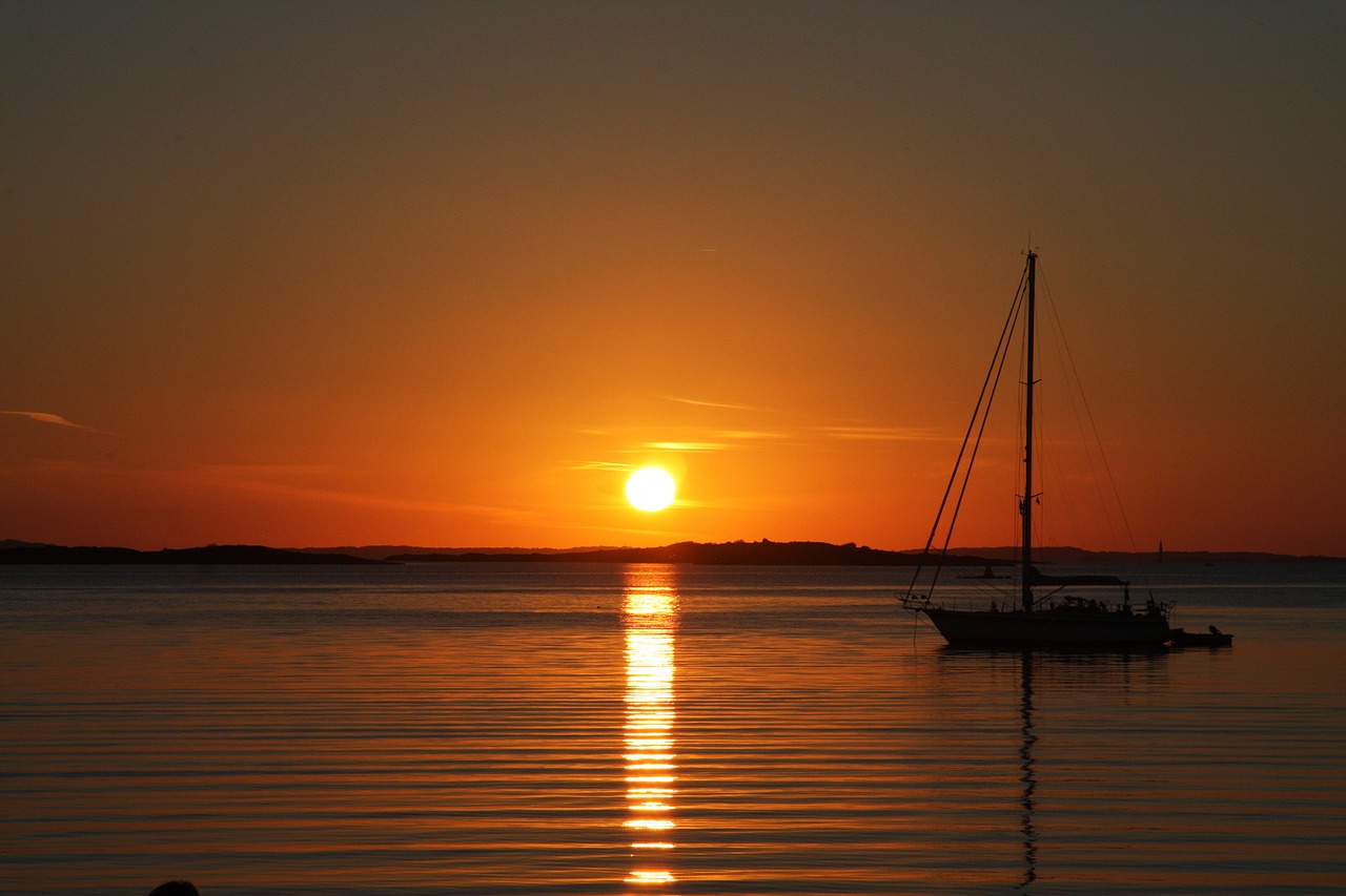 sunset sailing vessel sea free photo