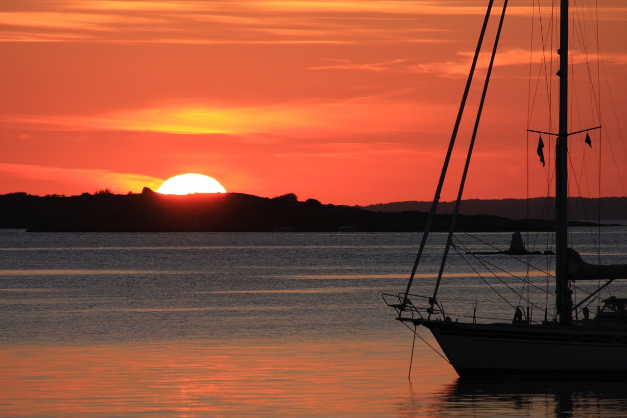 sunset sailing vessel sea free photo