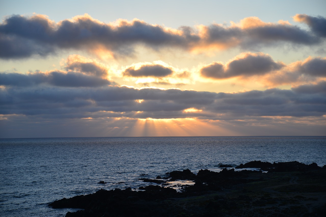 sunset clouds sunbeams free photo