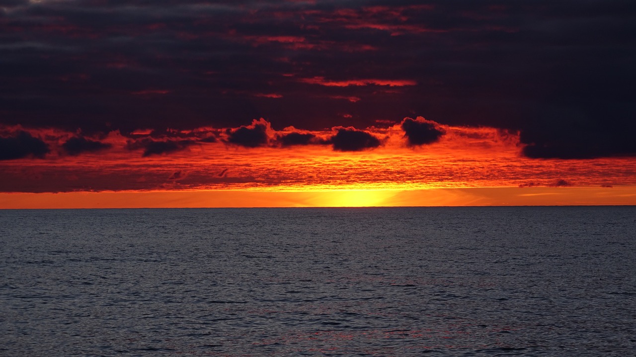sunset at sea  seaman's vision  ocean view free photo