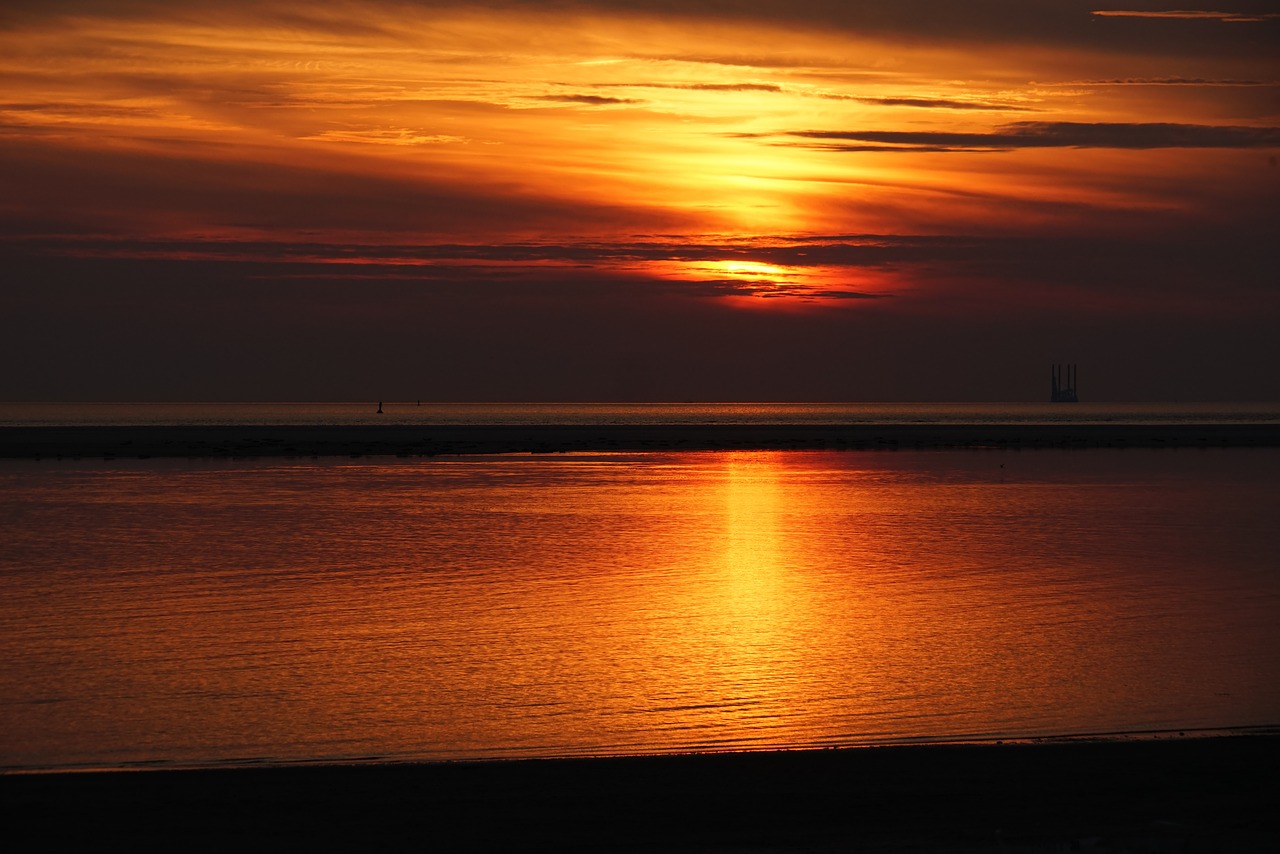 sunset borkum  dusk  sandbar free photo