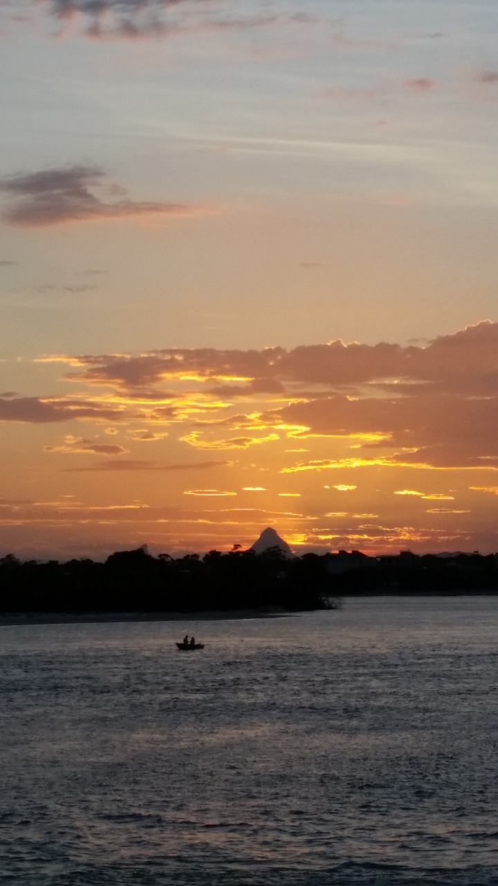 sunset with boat  sunset over water  glasshouse mountains sunset free photo