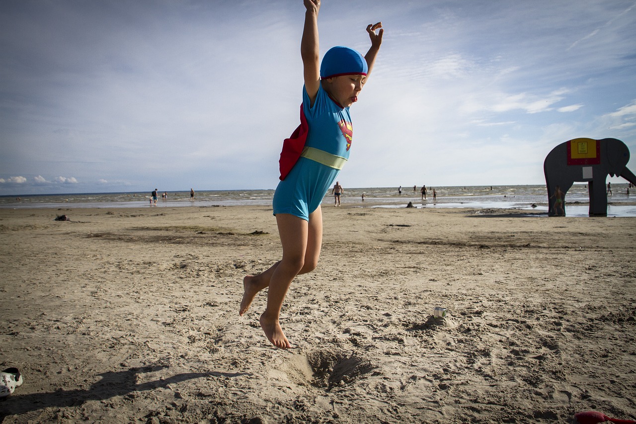 superman beach jump free photo
