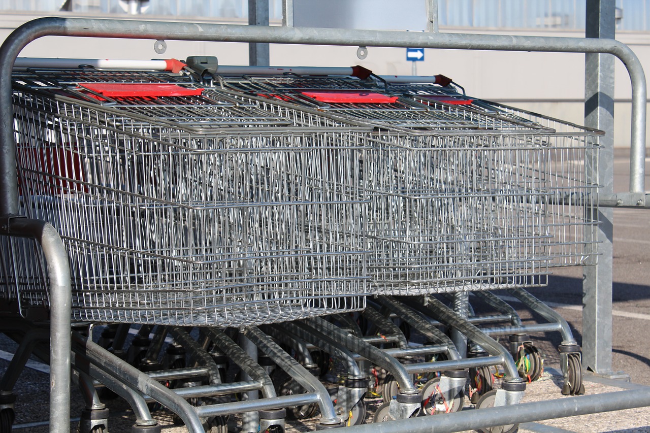 supermarket trolleys shopping trolleys carts free photo