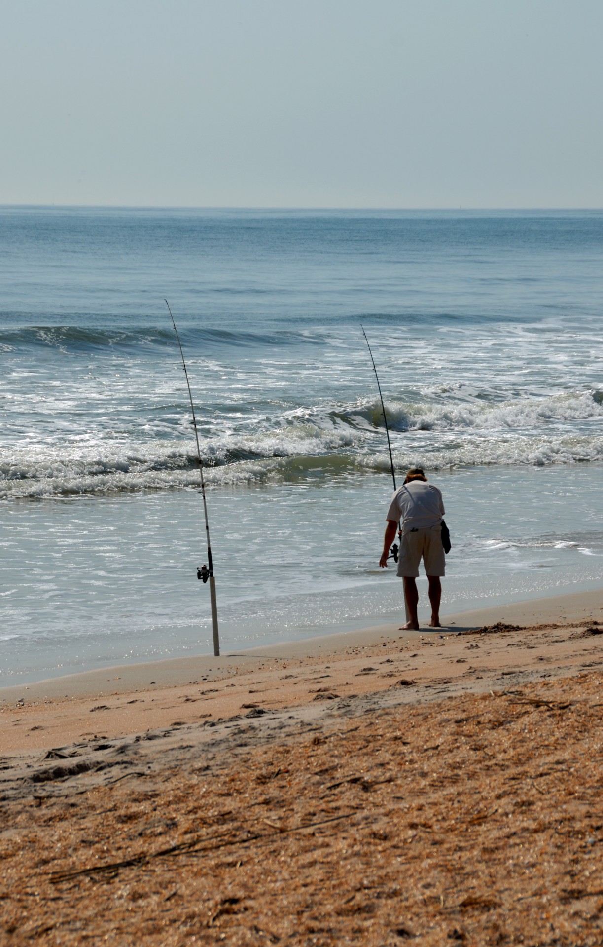 fisherman fishing surf free photo