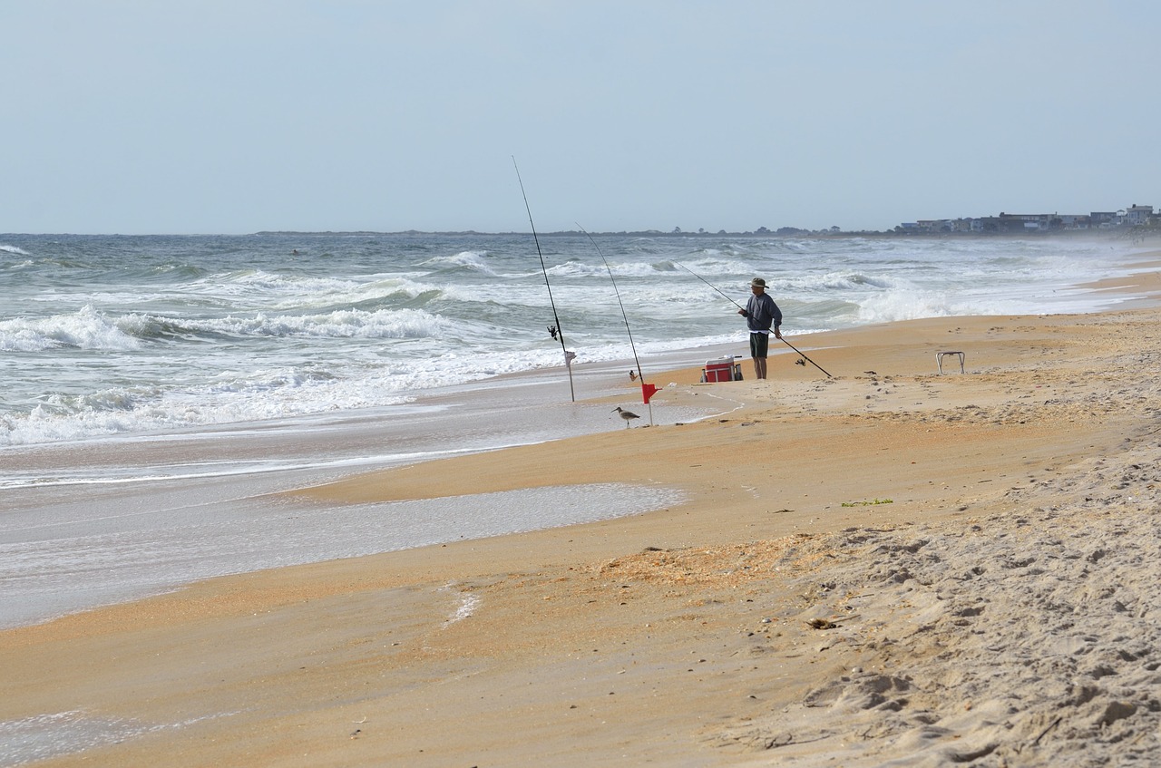 surf fishing fisherman ocean free photo