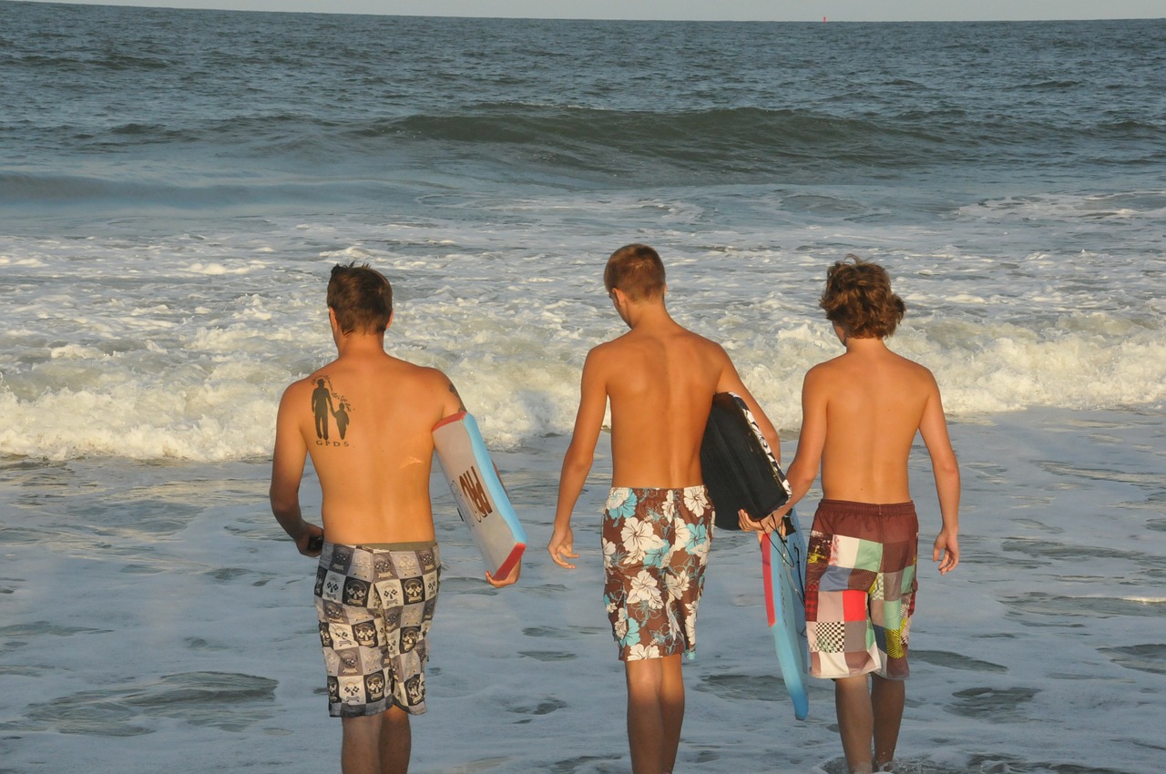 surfer boys beach free photo