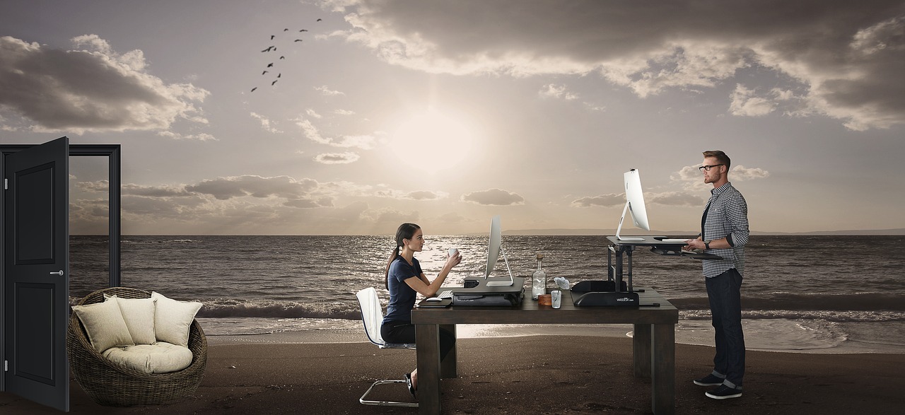 surreal working on the beach design free photo