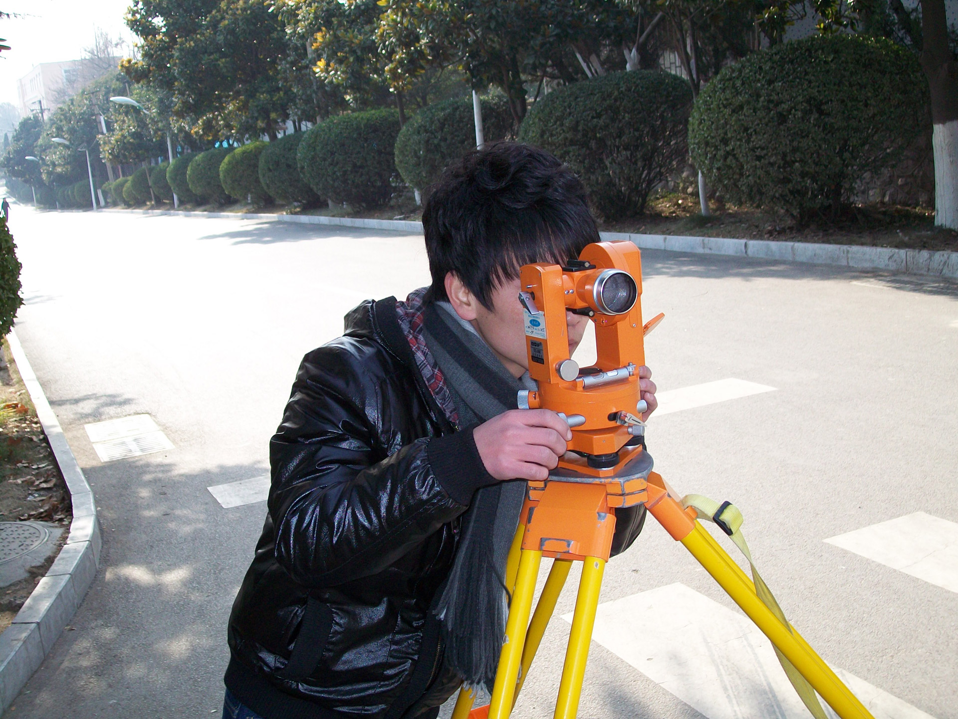 surveyor surveying land free photo
