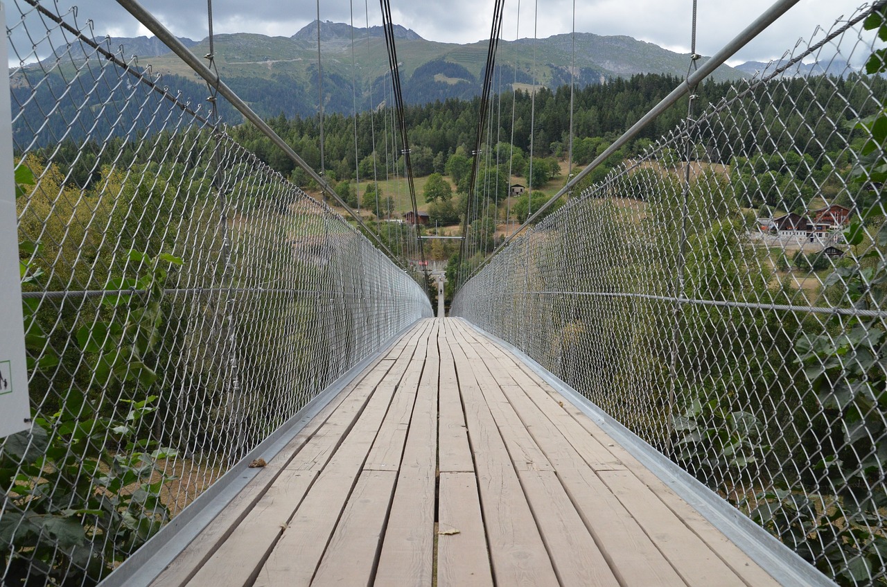 suspension bridge fürgangen bell forest goms free photo