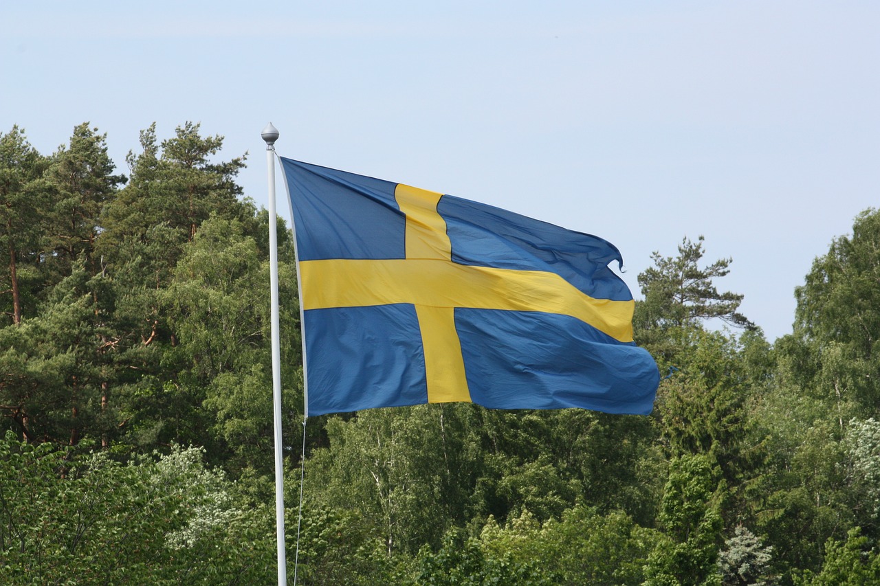 swedish flag sweden's flag yellow and blue free photo