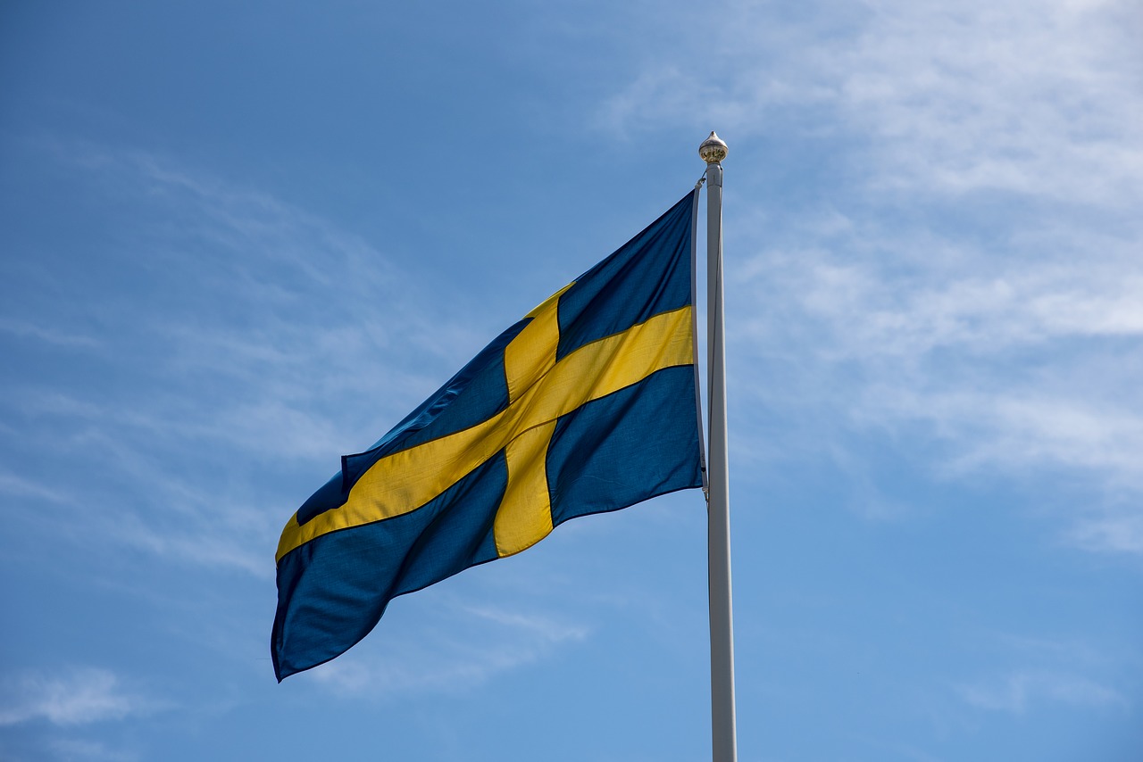 swedish flag  sweden  blue-and-yellow free photo