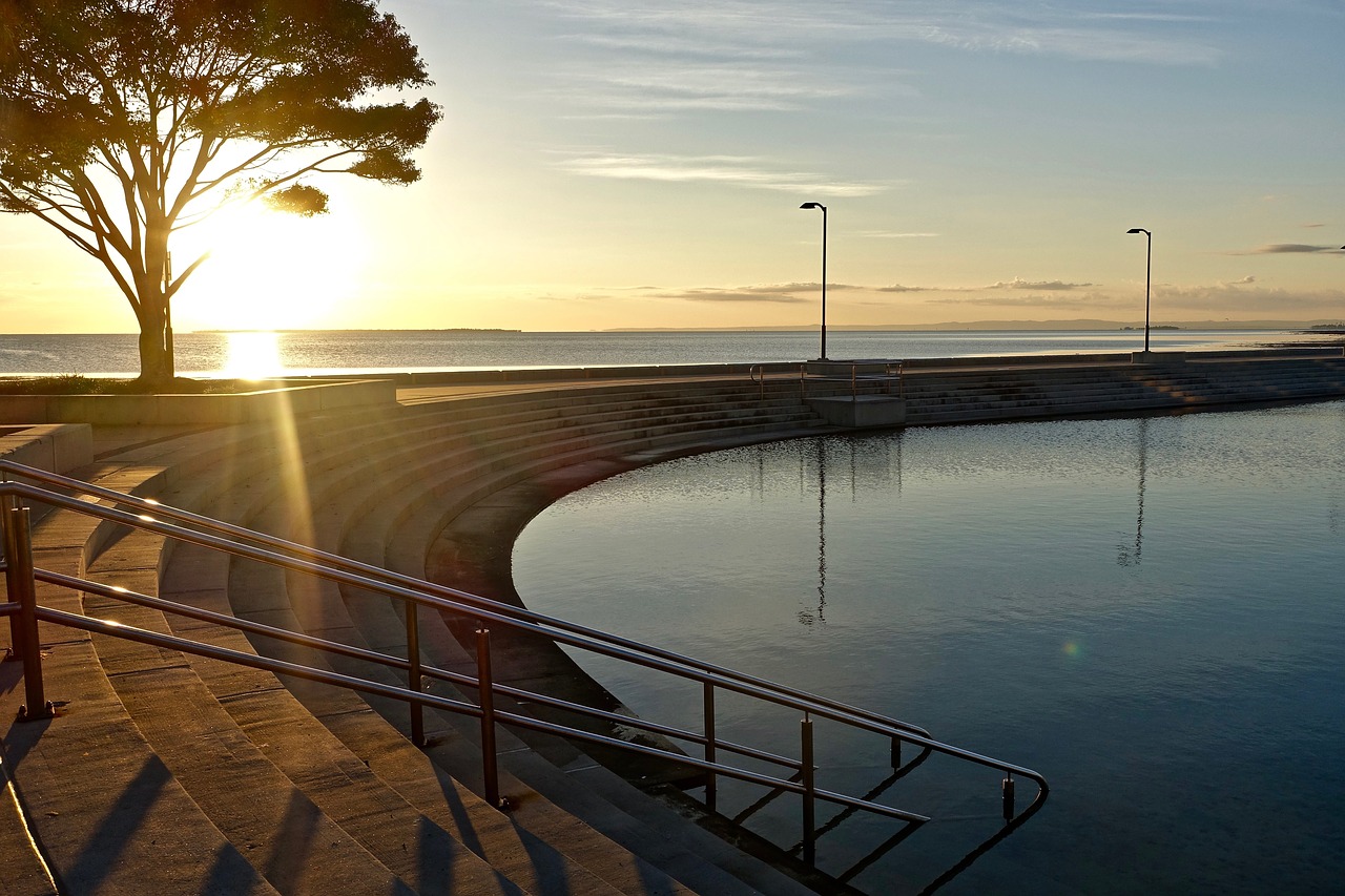 swimming pool sunlight relaxation free photo