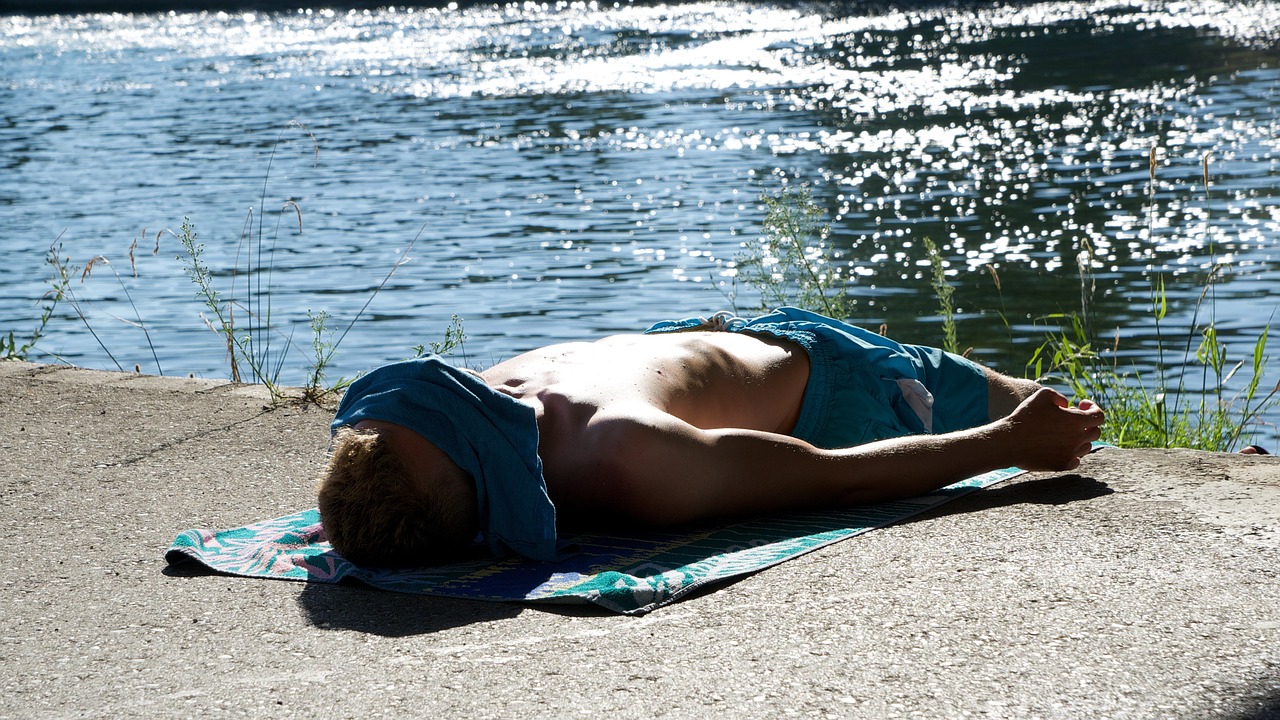 swimming trunks bath towel on the water free photo