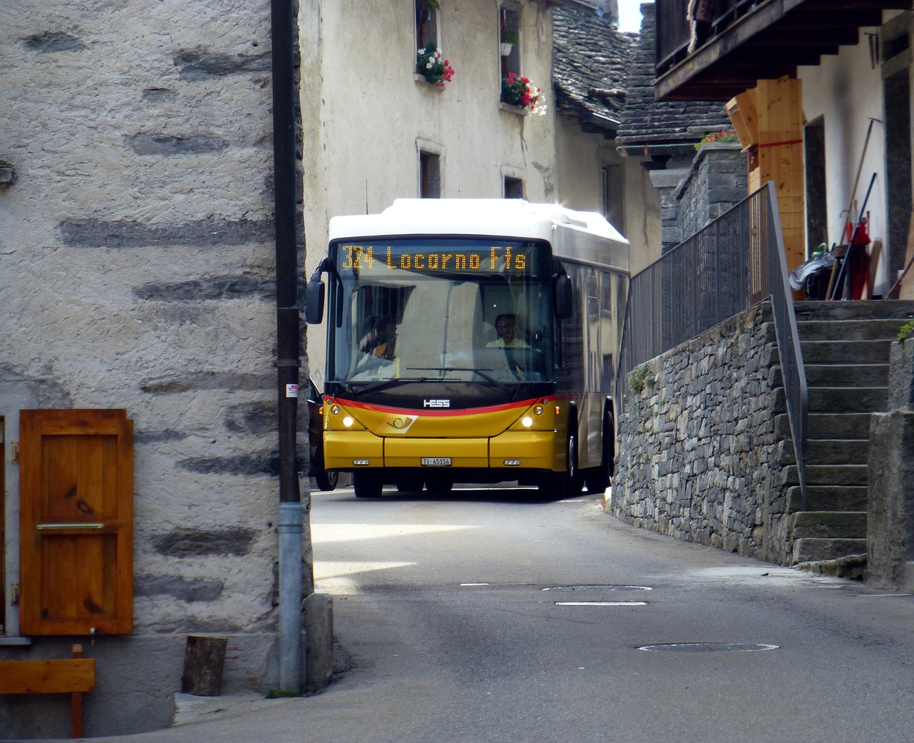 swiss postbus village narrow road free photo
