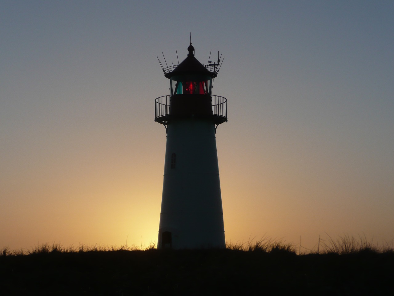 sylt lighthouse sunset free photo