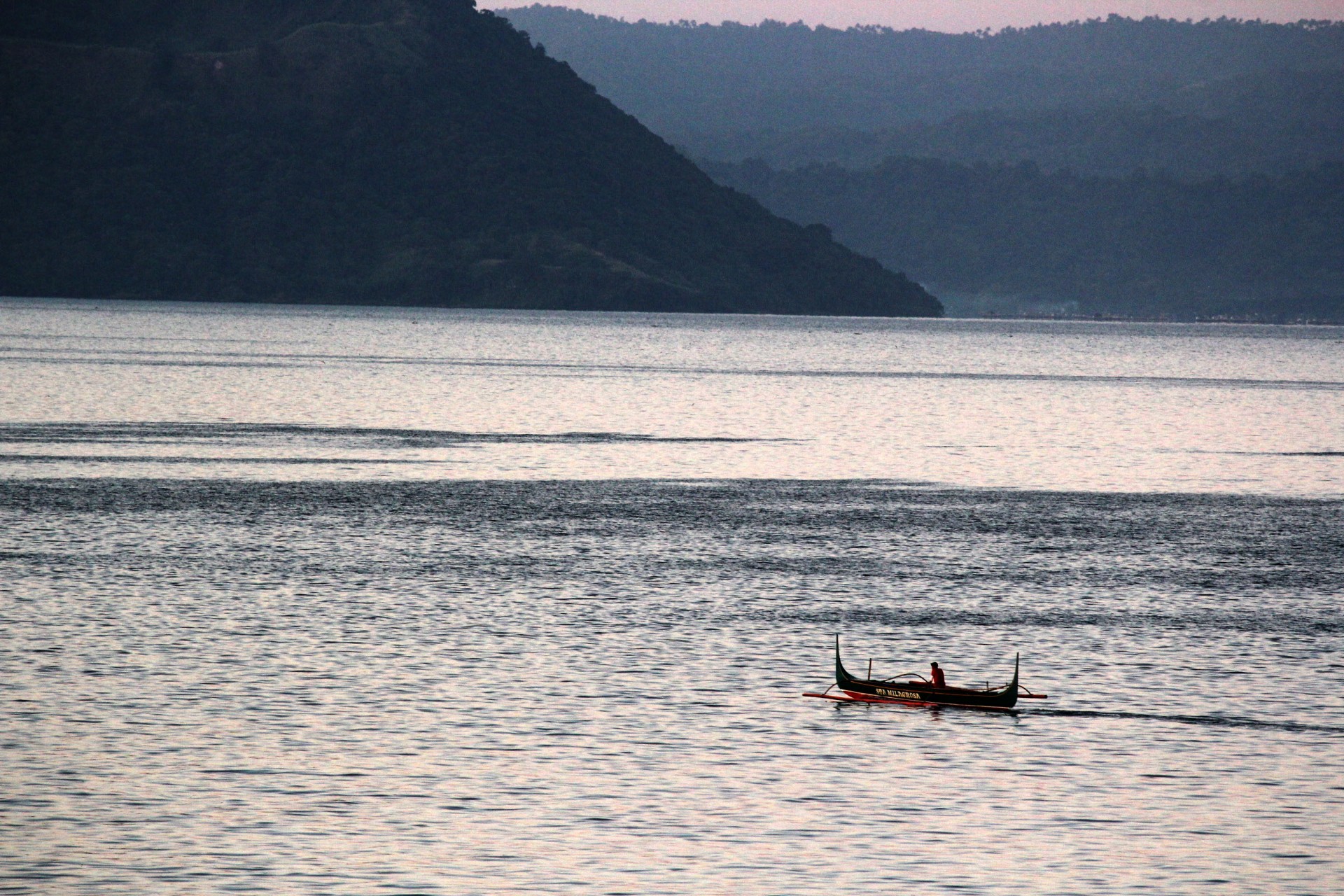 taal lake fishing alone free photo