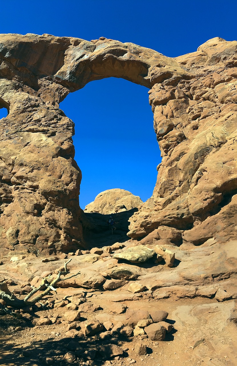tall sandstone arch  sandstone  arches free photo