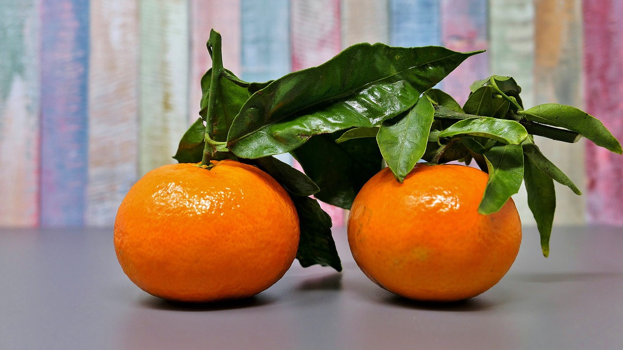 tangerines  fruit  mandarin leaves free photo