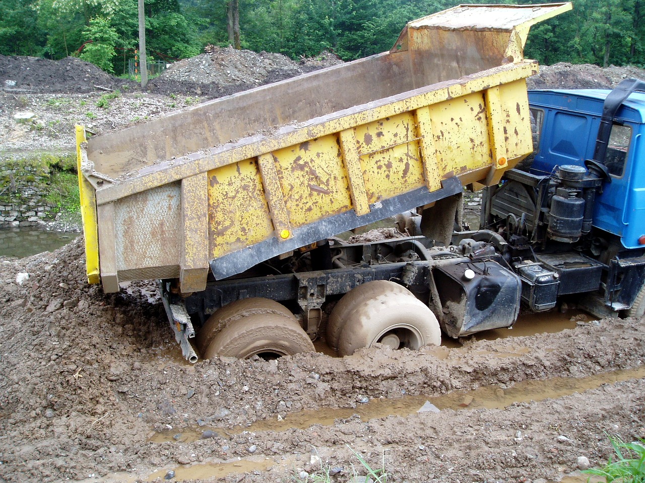 tatra in the mud building dump truck free photo