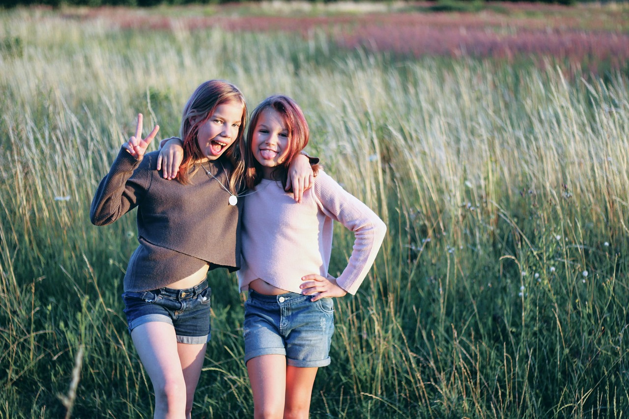 teenager  meadow  grass free photo