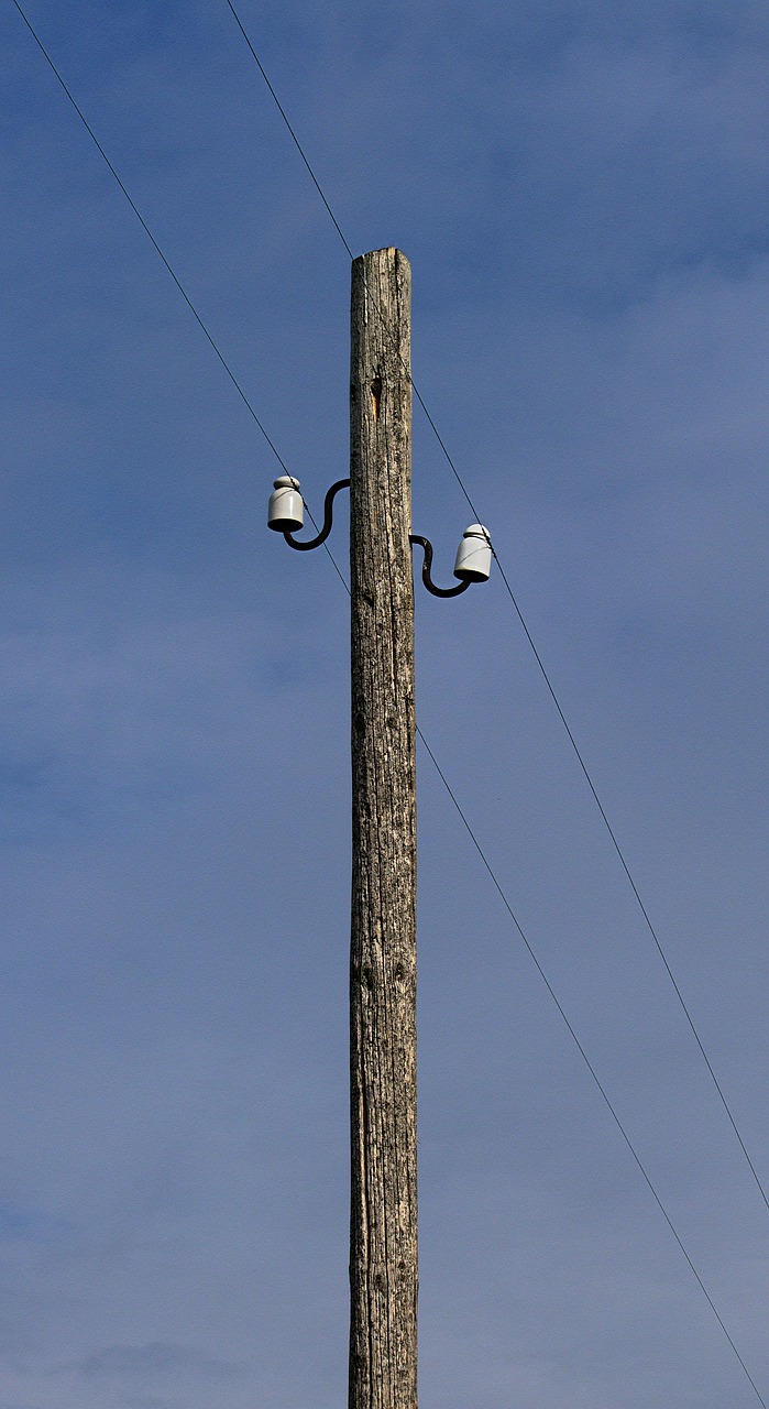 telephone pole  telegraph pole  overhead line free photo