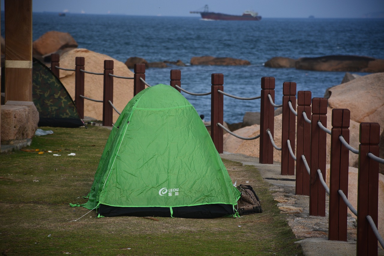 tent sea view early in the morning free photo