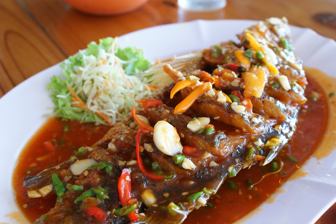 thai food fish in chili sweet sauce free photo
