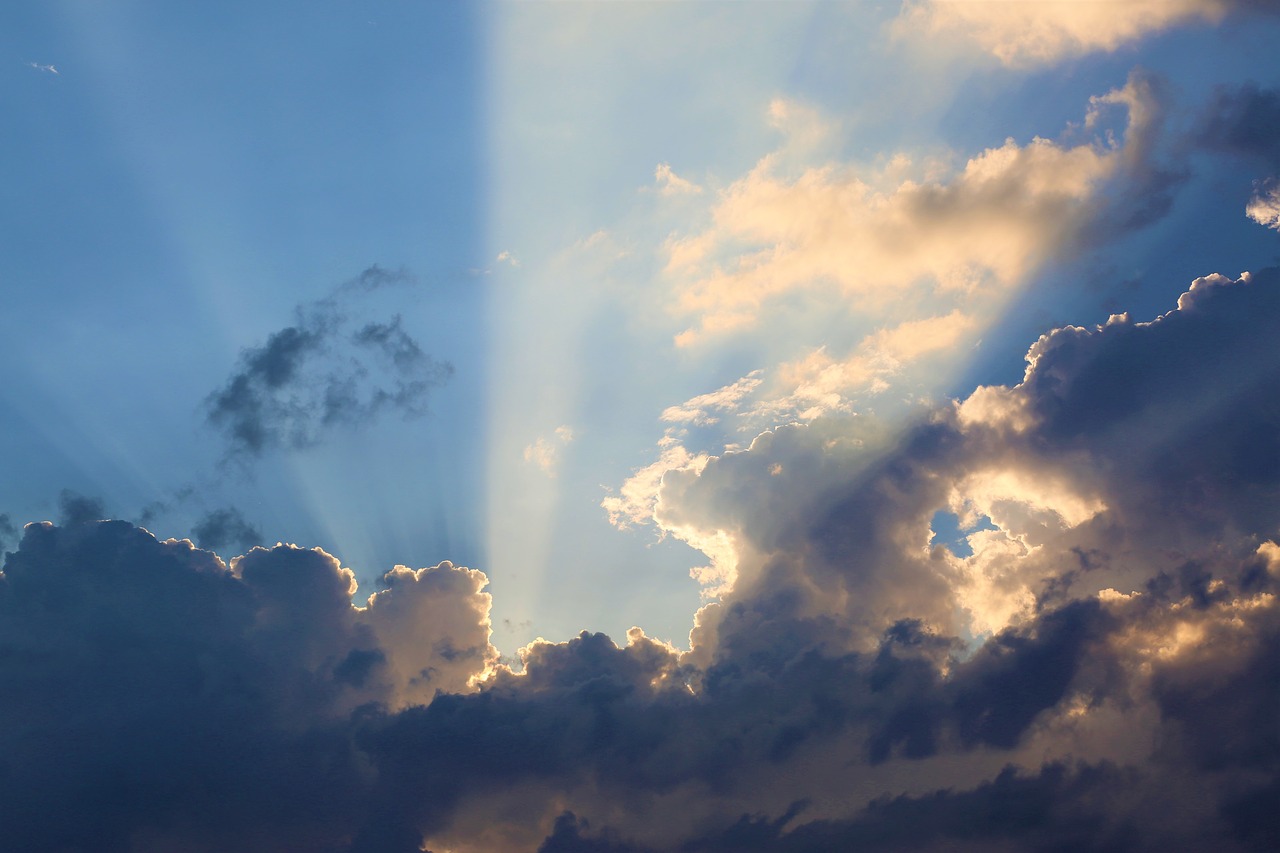 the beams of light  clouds  sunset free photo