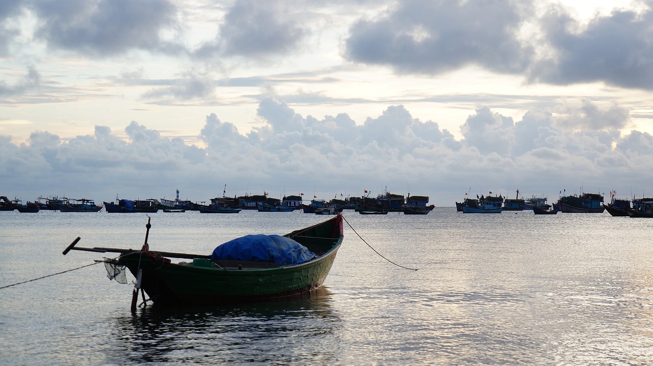 the boat the sea sunset free photo