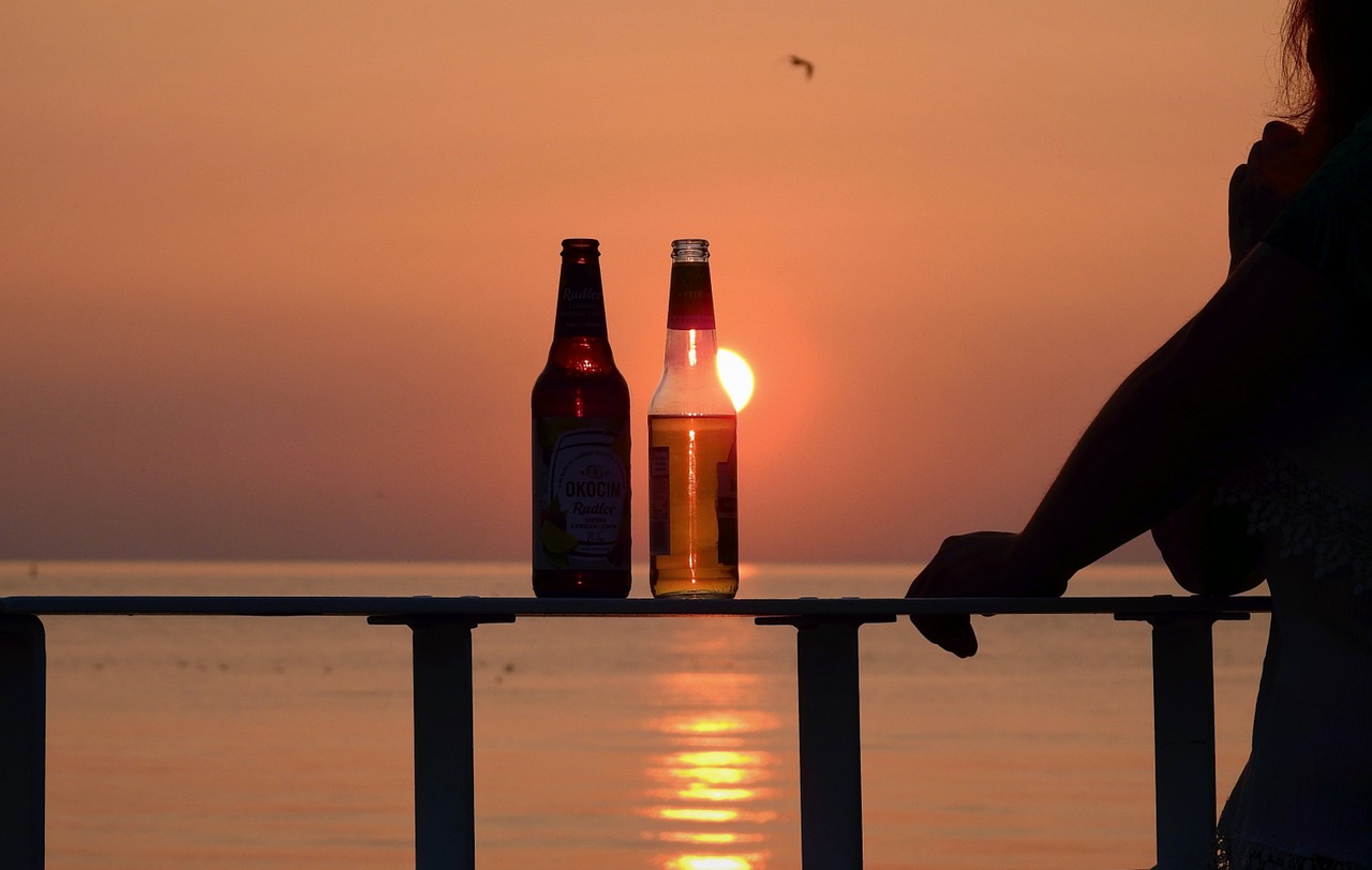 the bottle  a pair of lovers  sunset free photo