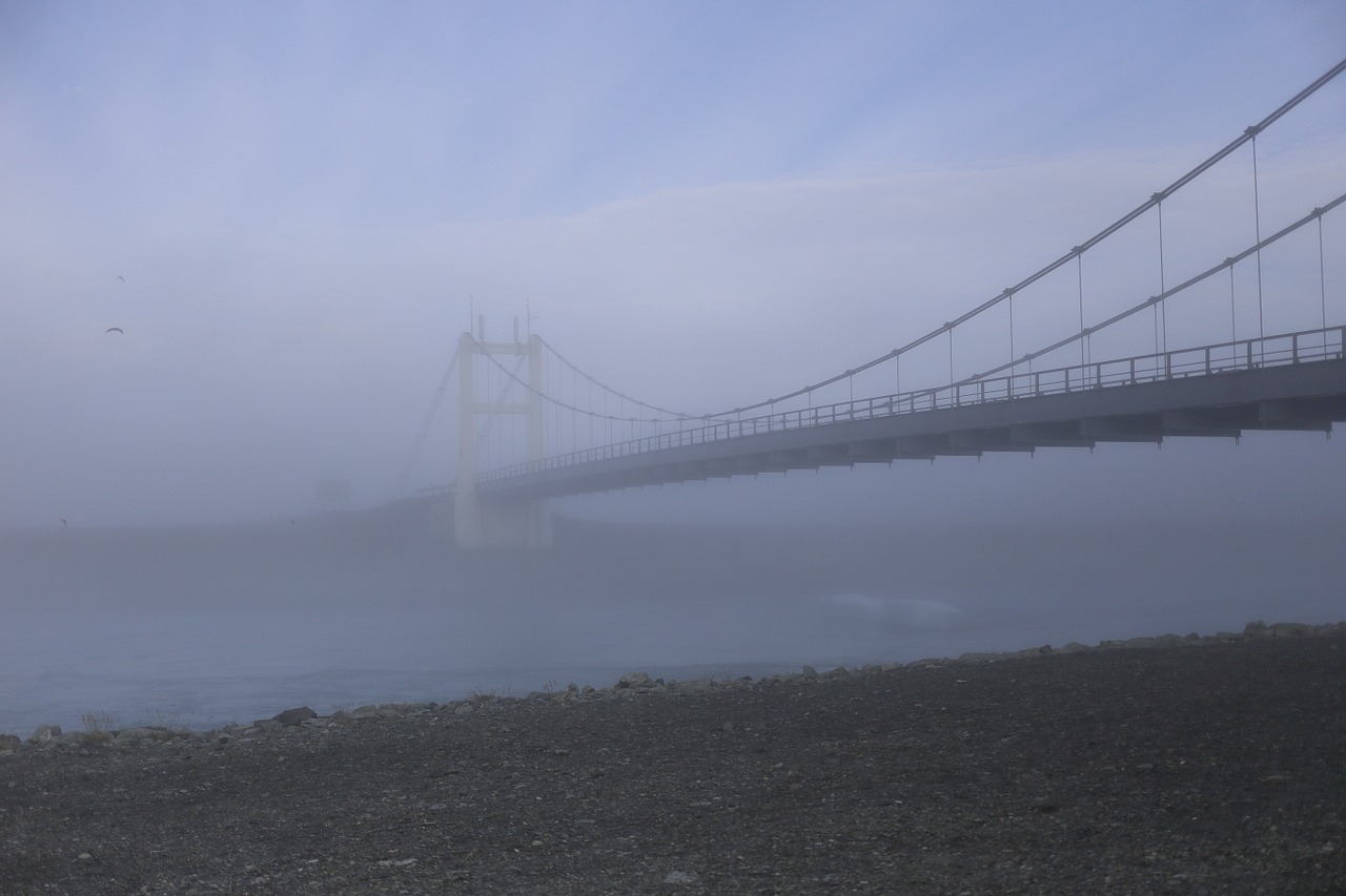 the bridge in fog river iceland free photo