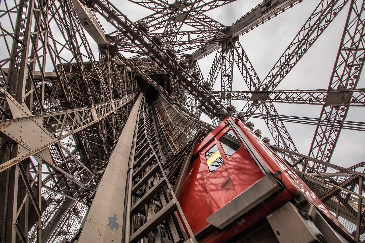 the eiffel tower  lift  architecture free photo