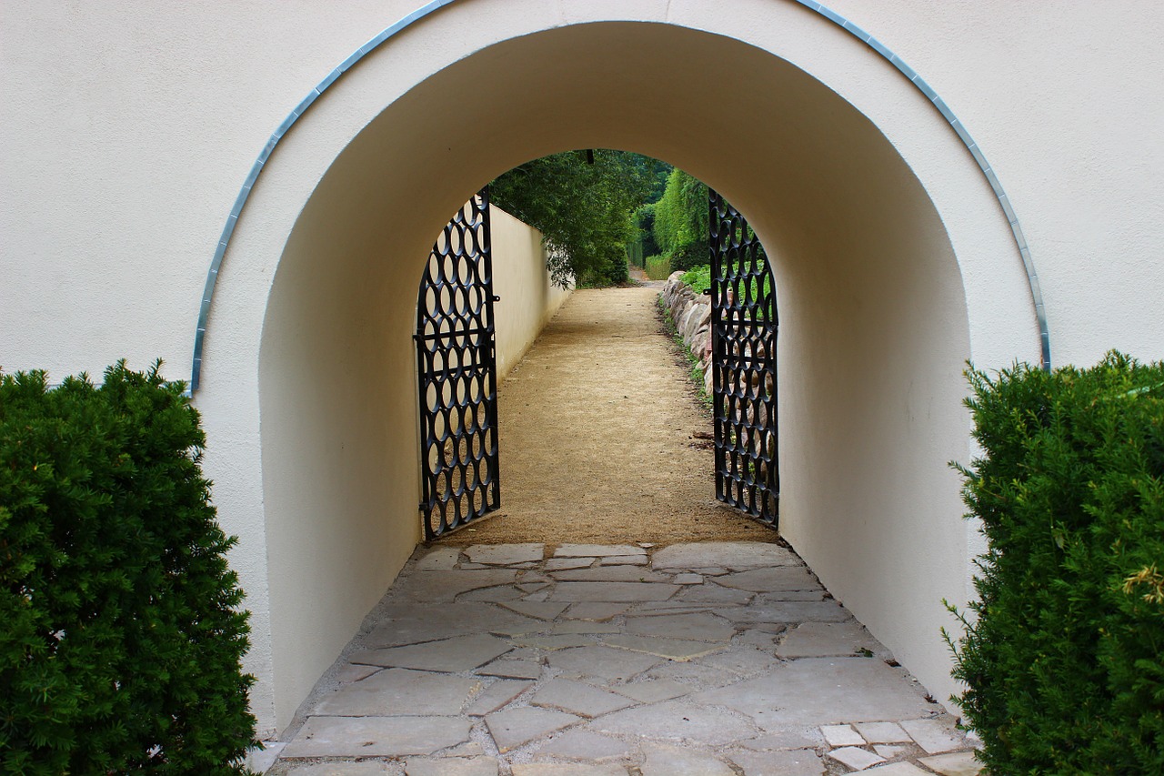the entrance to the garden garden gateway free photo