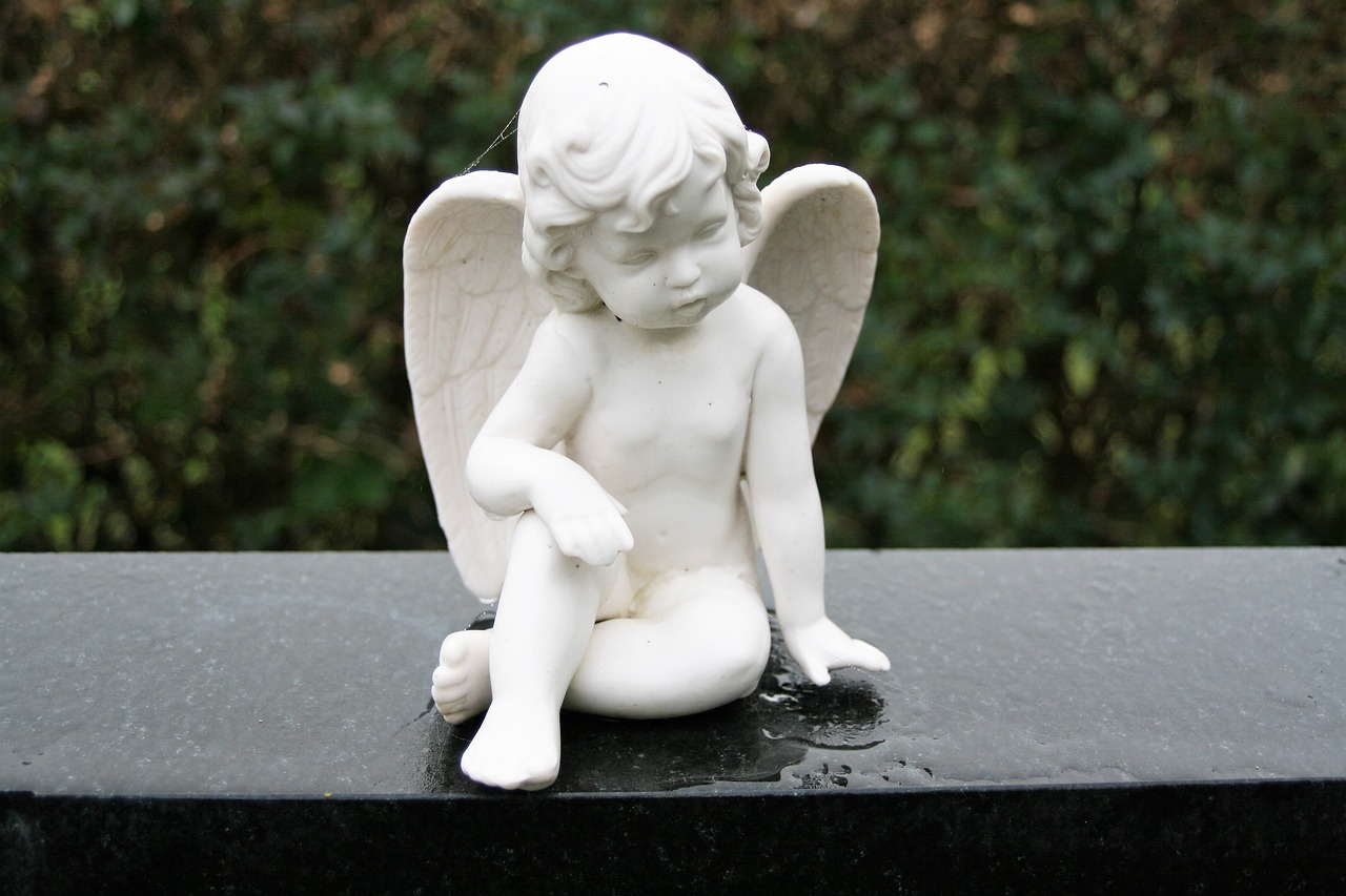 the figurine guardian angel cemetery free photo