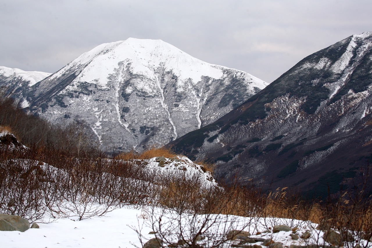 the first snow mountains stones free photo
