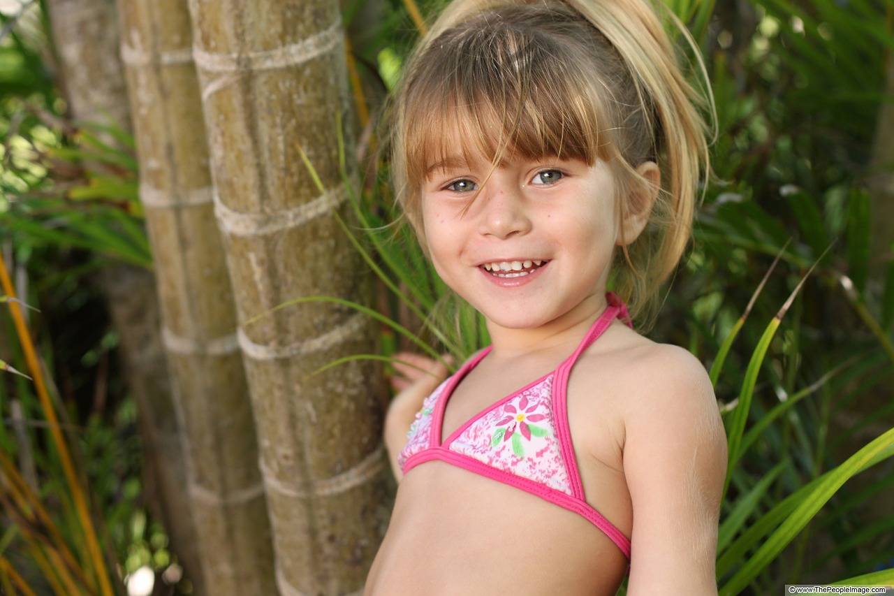 the little girl bikini a smile free photo